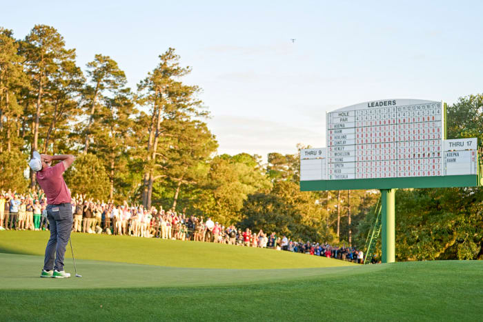 Jon Rahm exalts after winning the 2023 Masters.